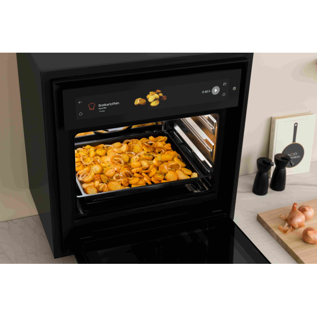 Four combiné vapeur 53 litres, cavité Inox. Verre noir