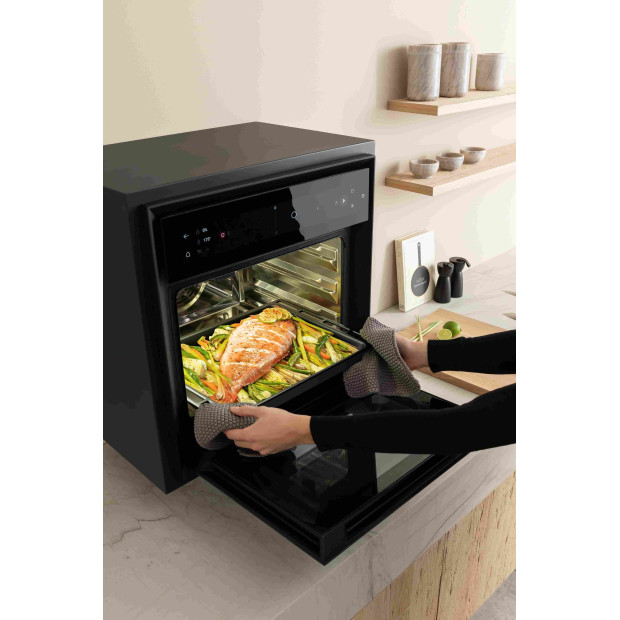 Four combiné vapeur 53 litres, cavité Inox. Verre noir