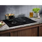 Table de cuisson 4 feux gaz email noir Electrolux